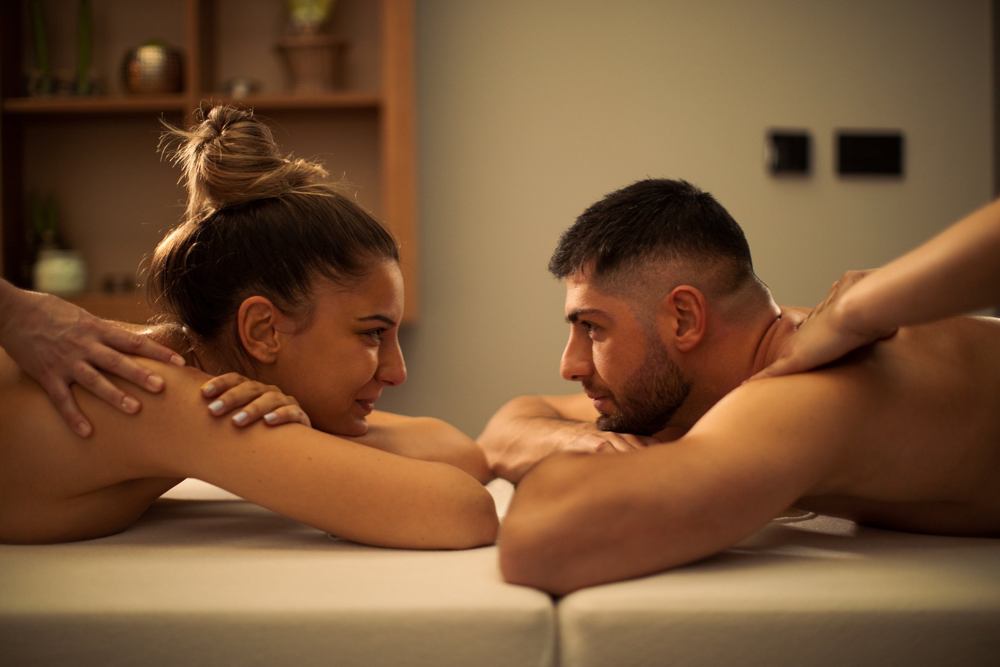 Young couple enjoying massage together